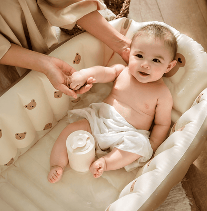baignoire bebe gonflable sourir
